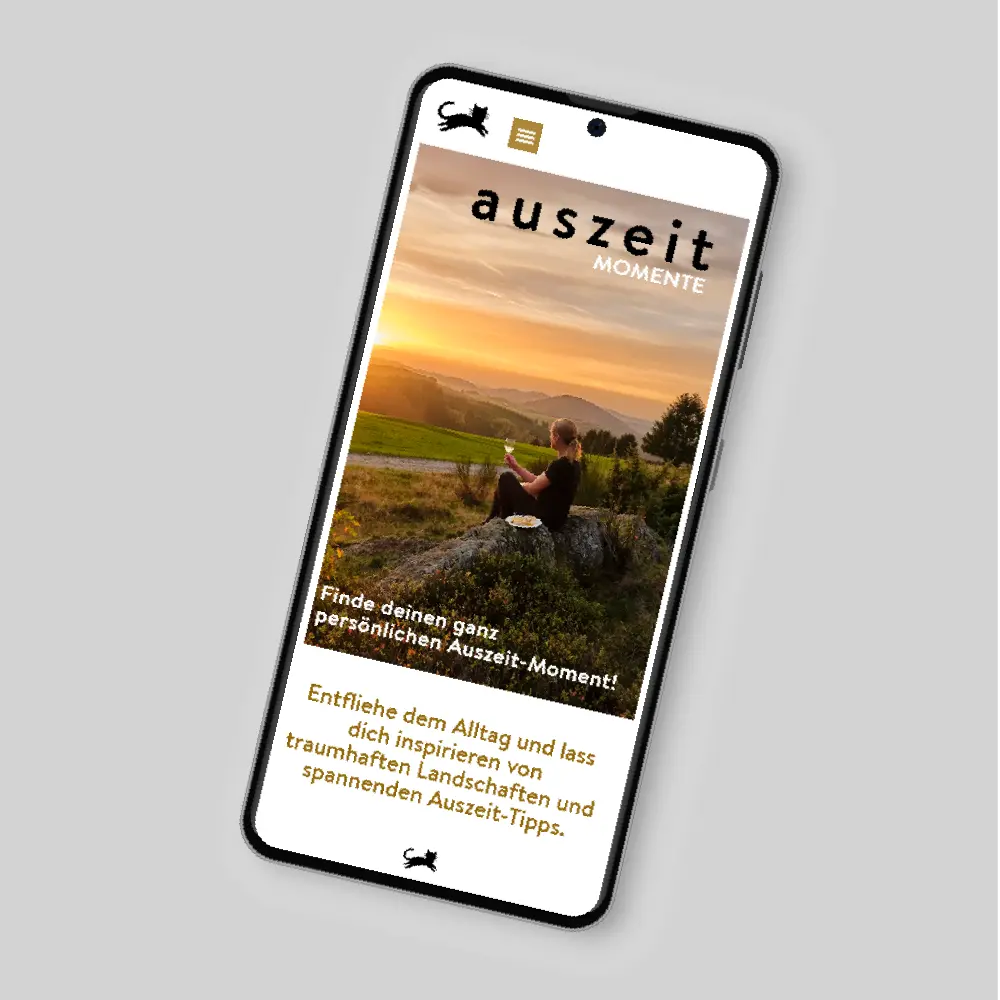 Mobiltelefon mit Startseite der Auszeit Webseite